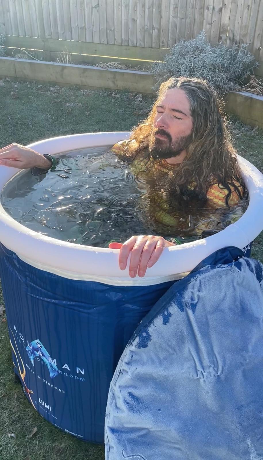 Gareth submerging in the ice bath.